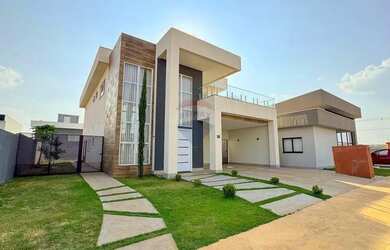 Imagem: A casa em condomínio possui 4 Dormitórios, 5 Banheiros, 400m²