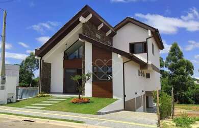 Imagem: A casa em condomínio possui 3 Dormitórios, 4 Banheiros, 2