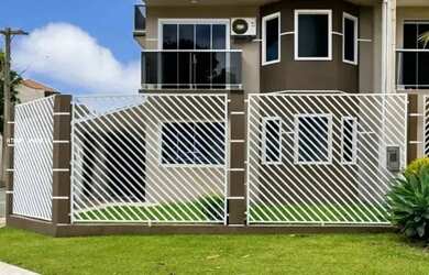 Imagem: A casa possui 5 Dormitórios, 4 Banheiros, 3 Vagas na garagem