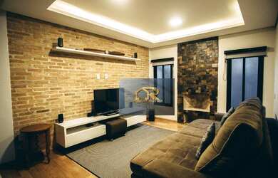 Imagem: A casa possui 3 Dormitórios, 5 Banheiros, 4 Vagas na garagem