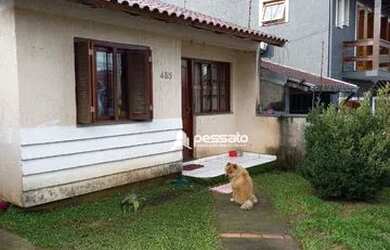 Imagem: A casa possui 2 Dormitórios, 1 Banheiro, 2 Vagas na garagem