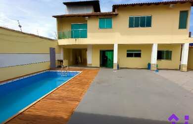 Imagem: A casa possui 4 Dormitórios, 4 Banheiros, 4 Vagas na garagem