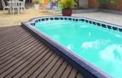 Imagem: A casa possui 4 Dormitórios, 4 Banheiros, 2 Vagas na garagem