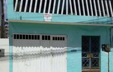 Imagem: A casa possui 2 Dormitórios, 1 Banheiro, 1 Vaga na garagem