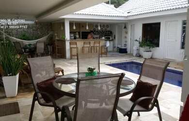 Imagem: A casa em condomínio possui 5 Dormitórios, 5 Banheiros, 5