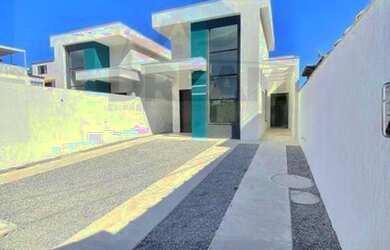 Imagem: A casa possui 3 Dormitórios, 2 Banheiros, 2 Vagas na garagem