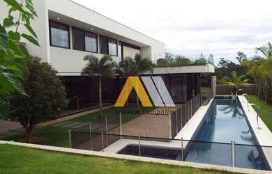 Imagem: A casa em condomínio possui 4 Dormitórios, 5 Banheiros, 4