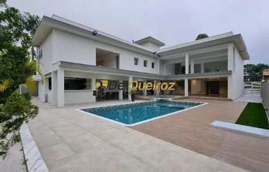 Imagem: A casa em condomínio possui 4 Dormitórios, 5 Banheiros, 5