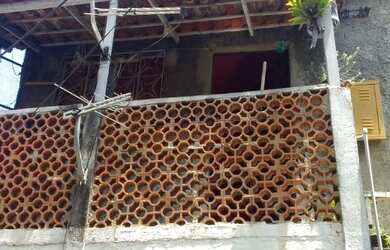 Imagem: A casa possui 2 Dormitórios, 1 Banheiro, 38m² de Área e Varanda