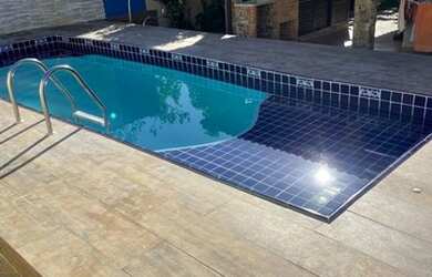 Imagem: A casa possui 2 Dormitórios, 2 Vagas na garagem e está localizado