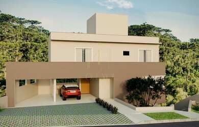 Imagem: A casa possui 3 Dormitórios, 5 Banheiros, 3 Vagas na garagem