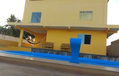 Imagem: A casa possui 4 Dormitórios, 4 Vagas na garagem e está localizado