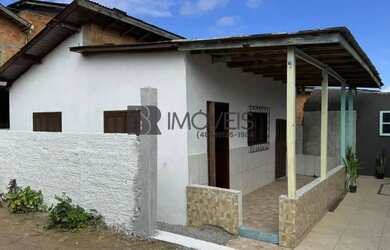 Imagem: A casa possui 1 Dormitório, 1 Banheiro, 1 Vaga na garagem