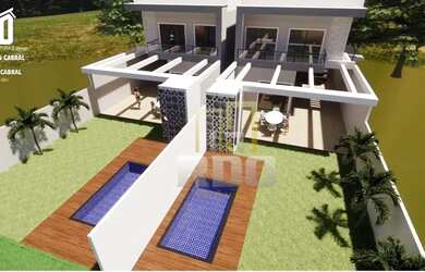 Imagem: A casa possui 3 Dormitórios, 4 Banheiros, 2 Vagas na garagem