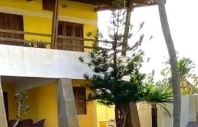 Imagem: A casa possui 5 Dormitórios, Acomodam 15 pessoas, 5 Vagas na