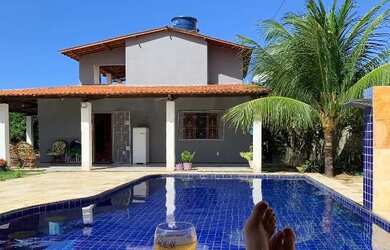 Imagem: A casa possui 3 Dormitórios, 5 Vagas na garagem e está localizado