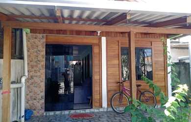 Imagem: A casa possui 2 Dormitórios, 1 Banheiro, 1 Vaga na garagem