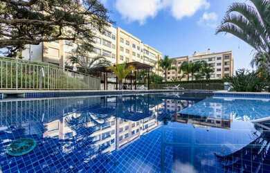 Imagem: O apartamento possui 3 Dormitórios, 2 Banheiros, 2 Vagas na