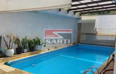 Imagem: A casa possui 5 Dormitórios, 4 Banheiros, 5 Vagas na garagem