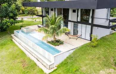 Imagem: A casa em condomínio possui 4 Dormitórios, 5 Banheiros, 5