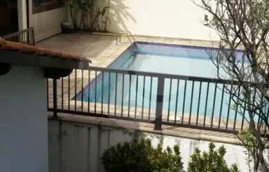 Imagem: A casa à venda possui 3 Dormitórios, 4 Banheiros, 5 Vagas