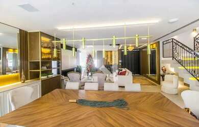 Imagem: A casa possui 5 Dormitórios, 5 Banheiros, 4 Vagas na garagem