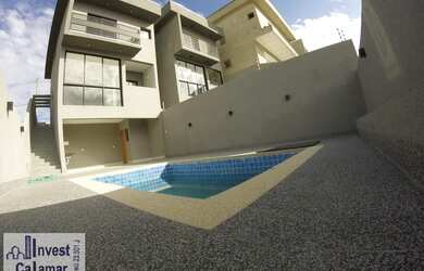 Imagem: A casa possui 3 Dormitórios, 3 Banheiros, 3 Vagas na garagem