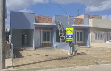 Imagem: A casa à venda possui 2 Dormitórios, 2 Banheiros, 2 Vagas