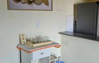 Imagem: A casa possui 3 Dormitórios, Acomodam 15 pessoas, 4 Vagas na