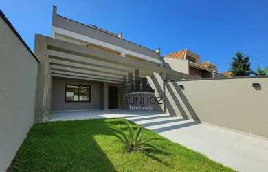 Imagem: A casa possui 3 Dormitórios, 3 Banheiros, 3 Vagas na garagem