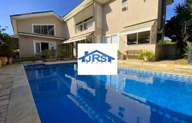 Imagem: A casa em condomínio possui 4 Dormitórios, 4 Banheiros, 4