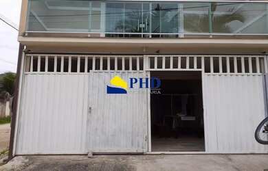 Imagem: A casa possui 2 Dormitórios, 2 Banheiros, 1 Vaga na garagem