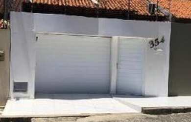 Imagem: A casa possui 3 Dormitórios, 1 Banheiro, 1 Vaga na garagem