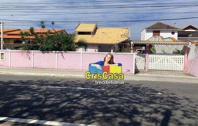 Imagem: A casa possui 4 Dormitórios, 2 Banheiros, 5 Vagas na garagem