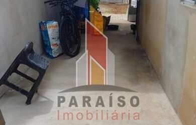 Imagem: A casa possui 2 Dormitórios, 1 Banheiro, 2 Vagas na garagem