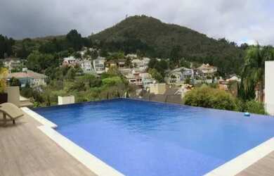 Imagem: A casa em condomínio possui 5 Dormitórios, 5 Banheiros, 5