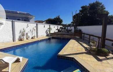 Imagem: A casa em condomínio possui 4 Dormitórios, 3 Banheiros, 2