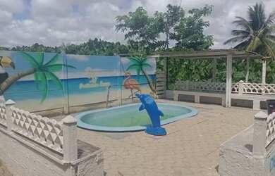 Imagem: A casa possui 4 Dormitórios, 3 Banheiros, 5 Vagas na garagem