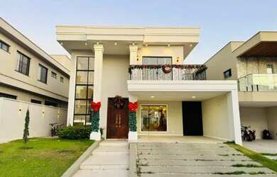 Imagem: A casa em condomínio possui 4 Dormitórios, 4 Banheiros, 4