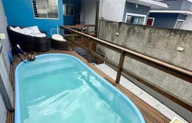 Imagem: A casa possui 2 Dormitórios, 1 Banheiro, 1 Vaga na garagem