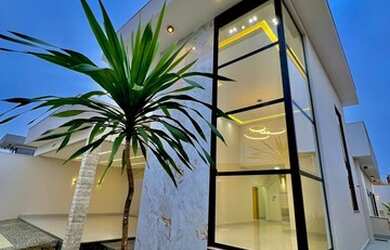 Imagem: A casa possui 4 Dormitórios, 5 Banheiros, 4 Vagas na garagem