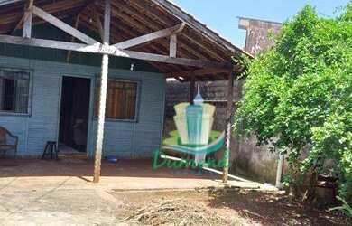 Imagem: A casa possui 2 Dormitórios, 1 Banheiro, 3 Vagas na garagem