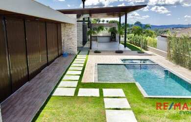 Imagem: A casa em condomínio possui 4 Dormitórios, 5 Banheiros, 5