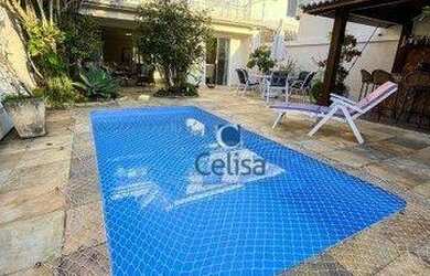 Imagem: A casa em condomínio possui 5 Dormitórios, 3 Banheiros, 4