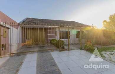 Imagem: A casa possui 3 Dormitórios, 2 Banheiros, 4 Vagas na garagem