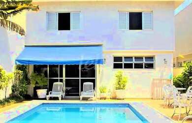 Imagem: A casa possui 4 Dormitórios, 4 Banheiros, 3 Vagas na garagem