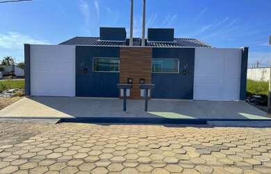 Imagem: A casa possui 2 Dormitórios, 2 Banheiros, 2 Vagas na garagem