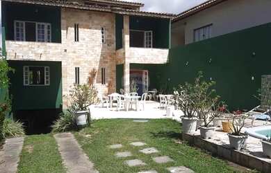 Imagem: A casa possui 4 Dormitórios, 4 Banheiros, 4 Vagas na garagem