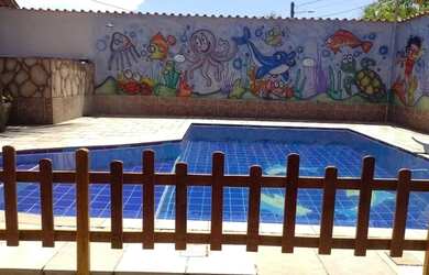 Imagem: A casa possui 2 Dormitórios, 3 Banheiros, 4 Vagas na garagem