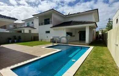 Imagem: A casa possui 4 Dormitórios, 2 Banheiros, 2 Vagas na garagem